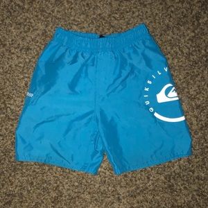 Sky-blue swimming trunks
